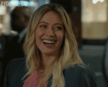 Hilary Duff in &quot;Younger&quot; smiles as she bites her lip