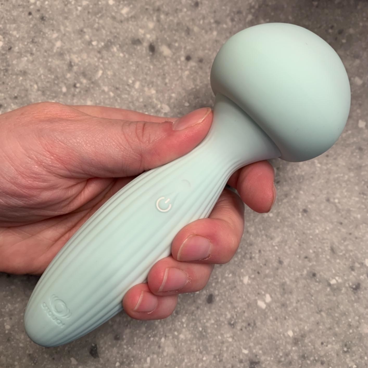 image of the blue Personal Mushroom Wand Massager in a reviewer&#x27;s hand