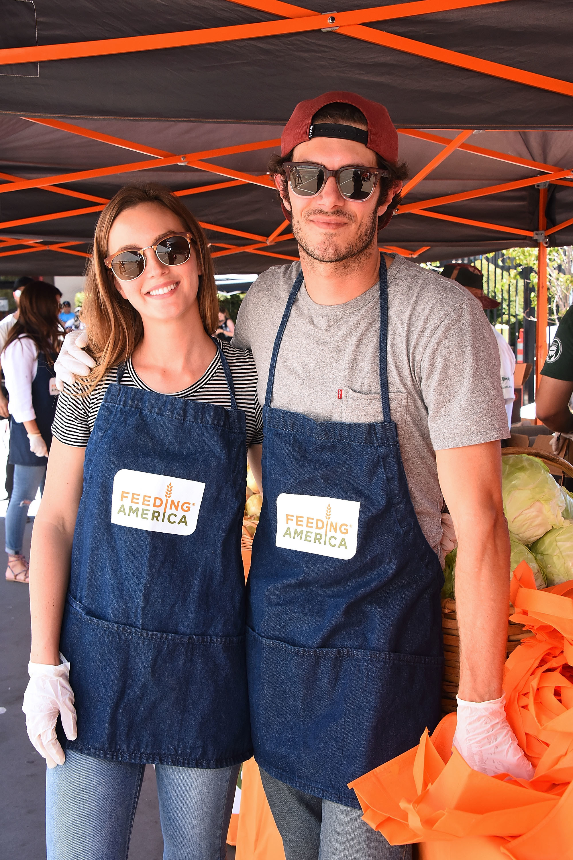 Meester and Brody volunteering at a Feeding America event in Los Angeles in 2017