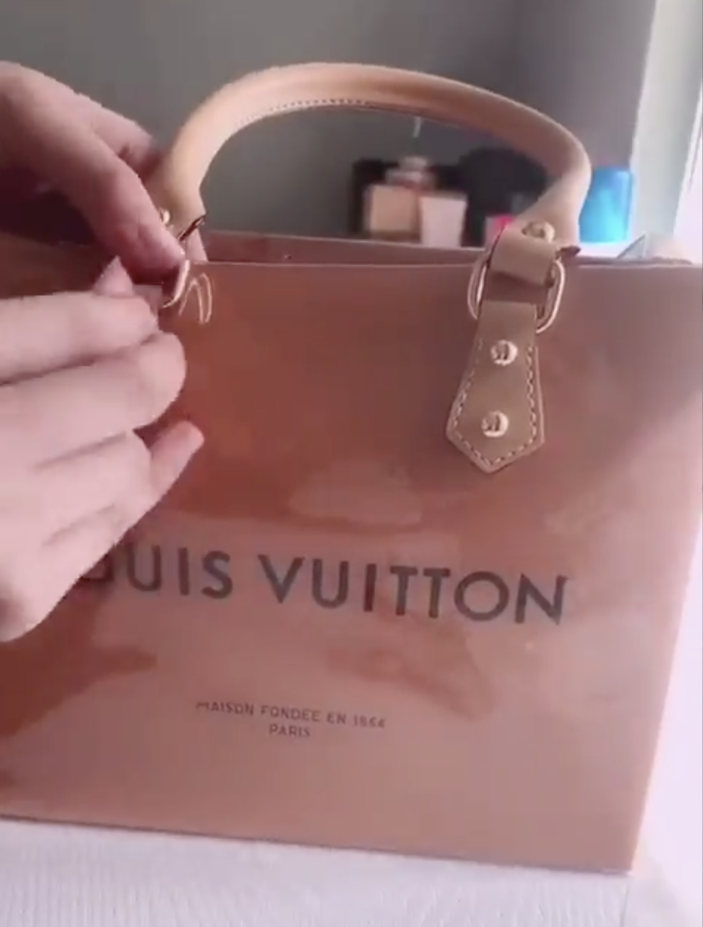 Louis Vuitton shopping bag turned cute new Louis purse !!! Like to