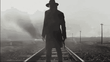 a man on train tracks