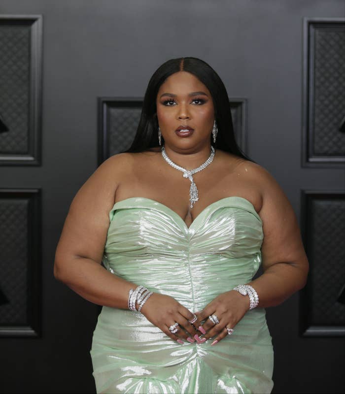 Lizzo wearing a strapless dress at the Grammys in 2021