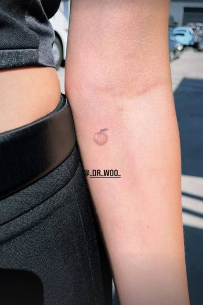 Hailey Bieber&#x27;s peach tattoo on her inner forearm