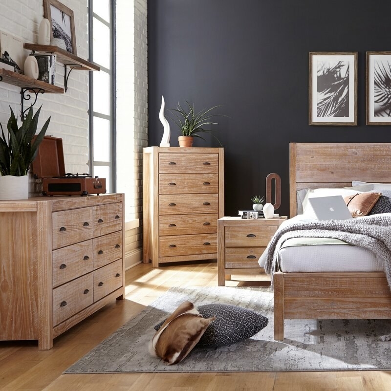 Wooden dressers, nightstand, and bed frame set with bronze hardware