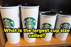 Four Starbucks coffee cups lined up form biggest to smallest.