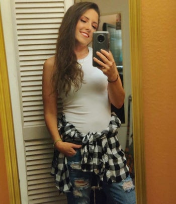 Reviewer wearing the white top