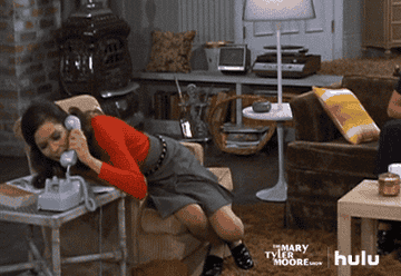 Mary Richards from &quot;The Mary Tyler Moore Show&quot; hangs up the phone awkwardly