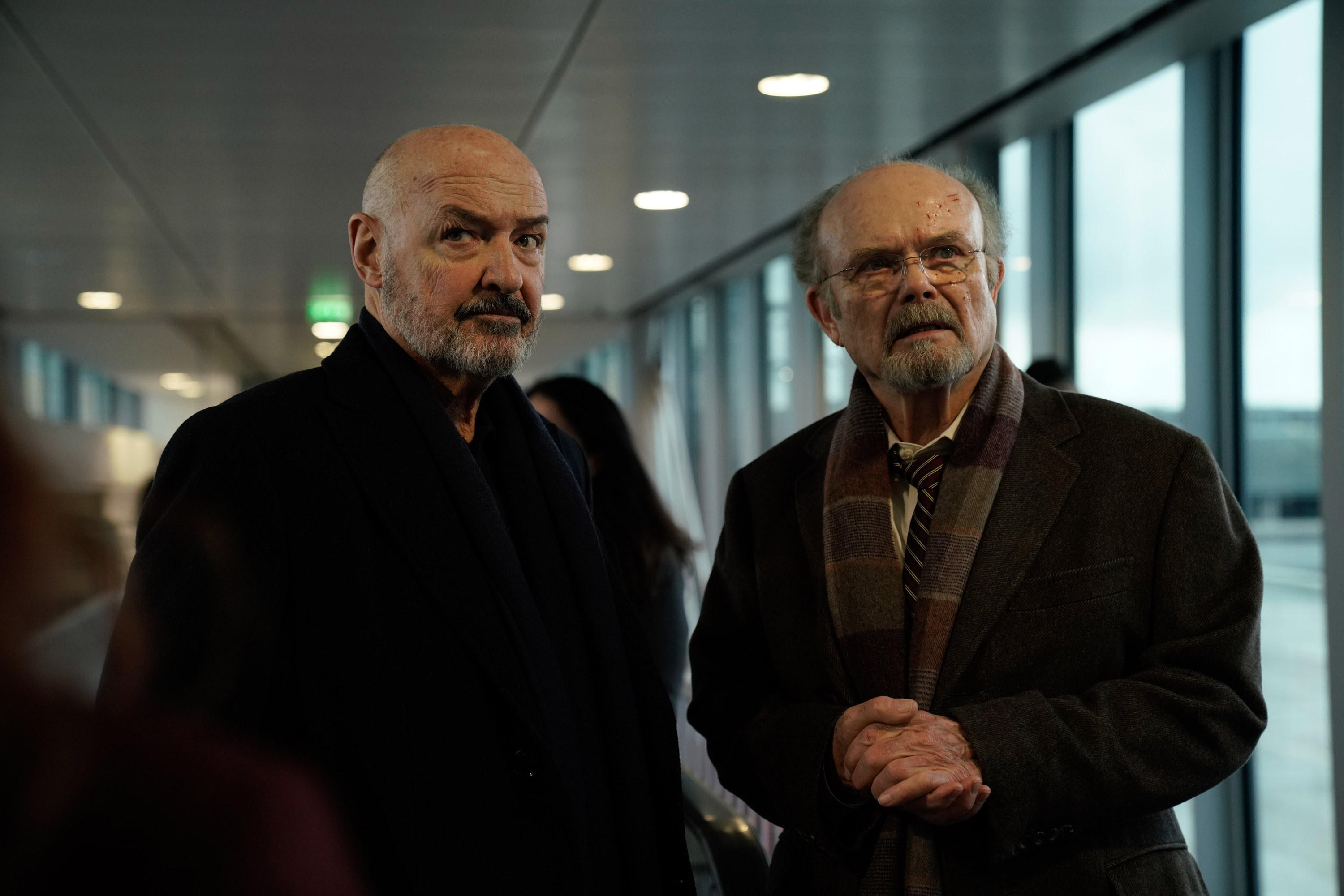 two men in an airport