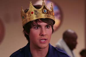 James from "Big Time Rush" wearing a plastic crown