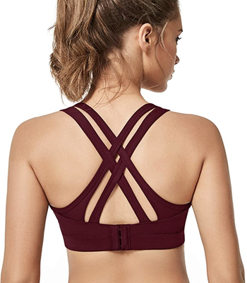 model in same sports bra with a criss-cross back design