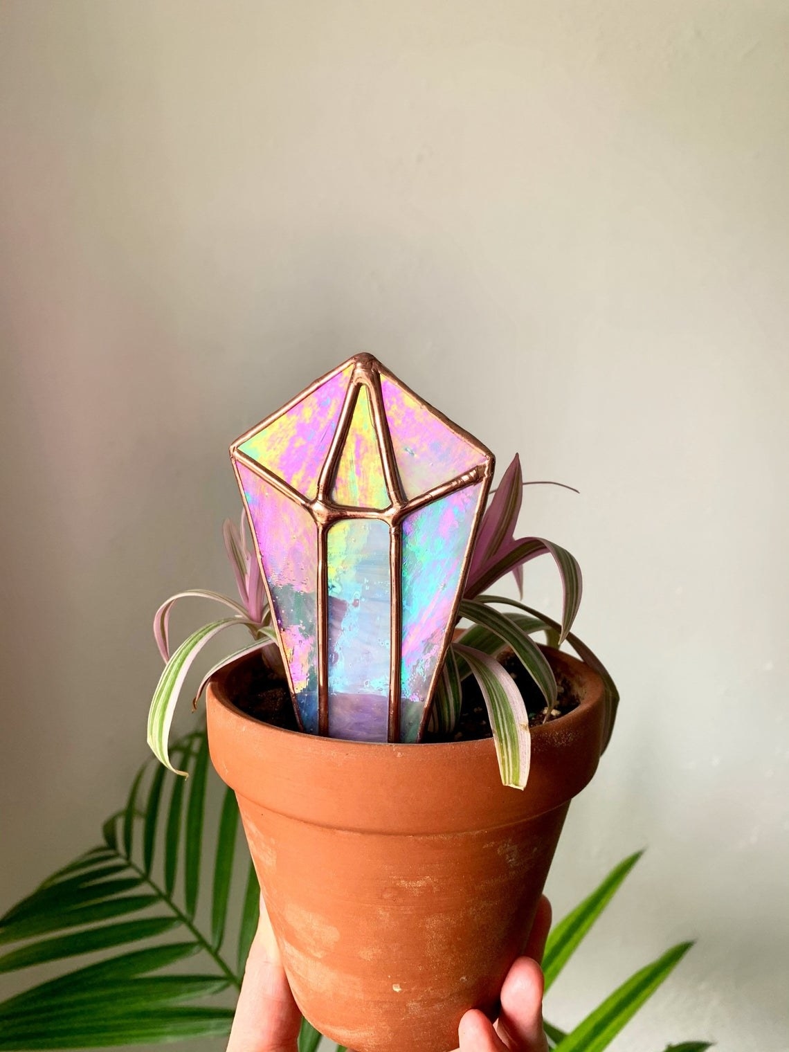 iridescent plant stake shaped like crystal 