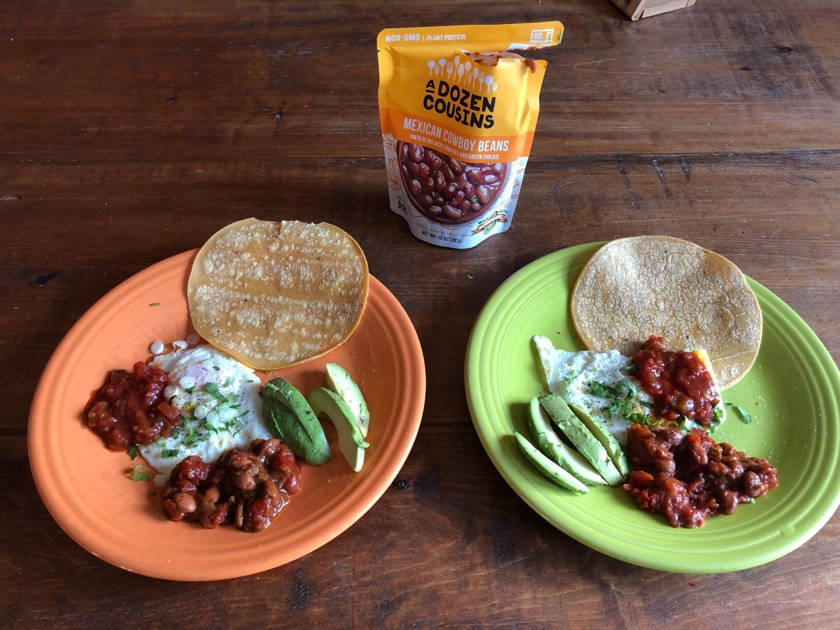 reviewer&#x27;s bag of pinto beans and some on a plate with avocado, tortillas, and cheese