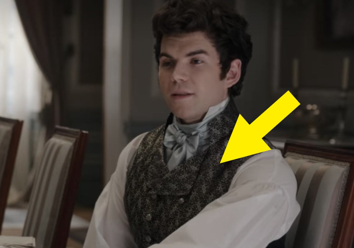 An arrow pointing at his waistcoat