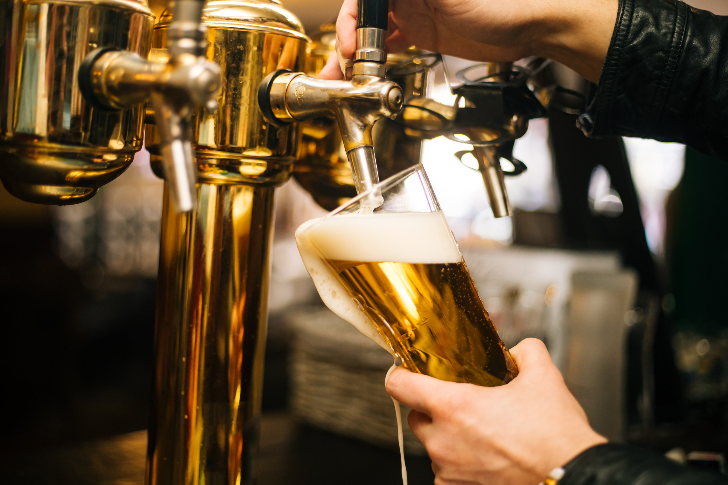 pint being poured from the tap