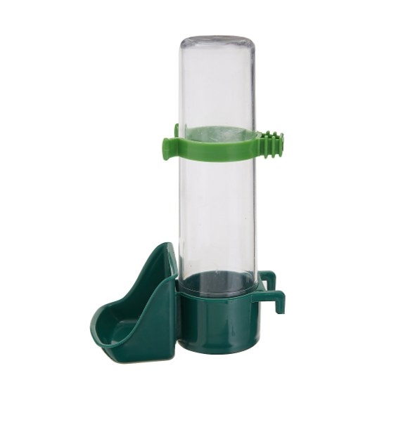 The clear interior bird feeder with a green base