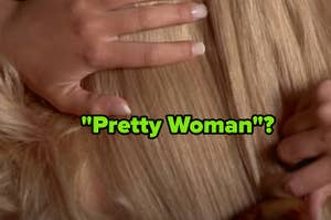 Elle Woods brushing her hair from the back in "Legally Blonde"