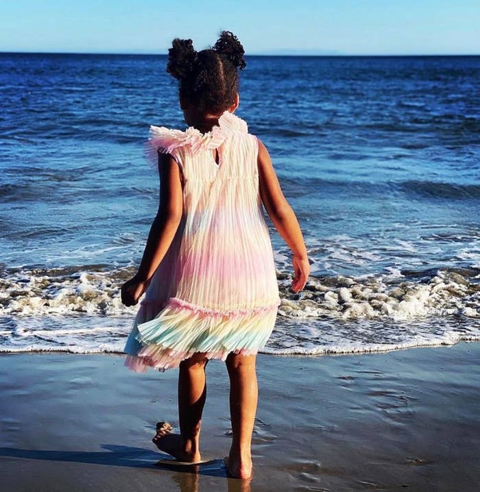 Beyoncé's daughter Rumi walking on the beach