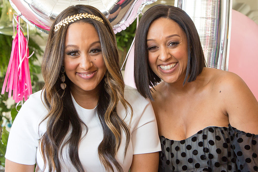 Tamera Mowry-Housley (L) and Tia Mowry attend Tamera Mowry-Housley&#x27;s baby shower