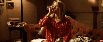 Bridget in pajamas drinking