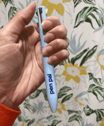 GIF of Jasmin pushing down the lip liner function of the pen