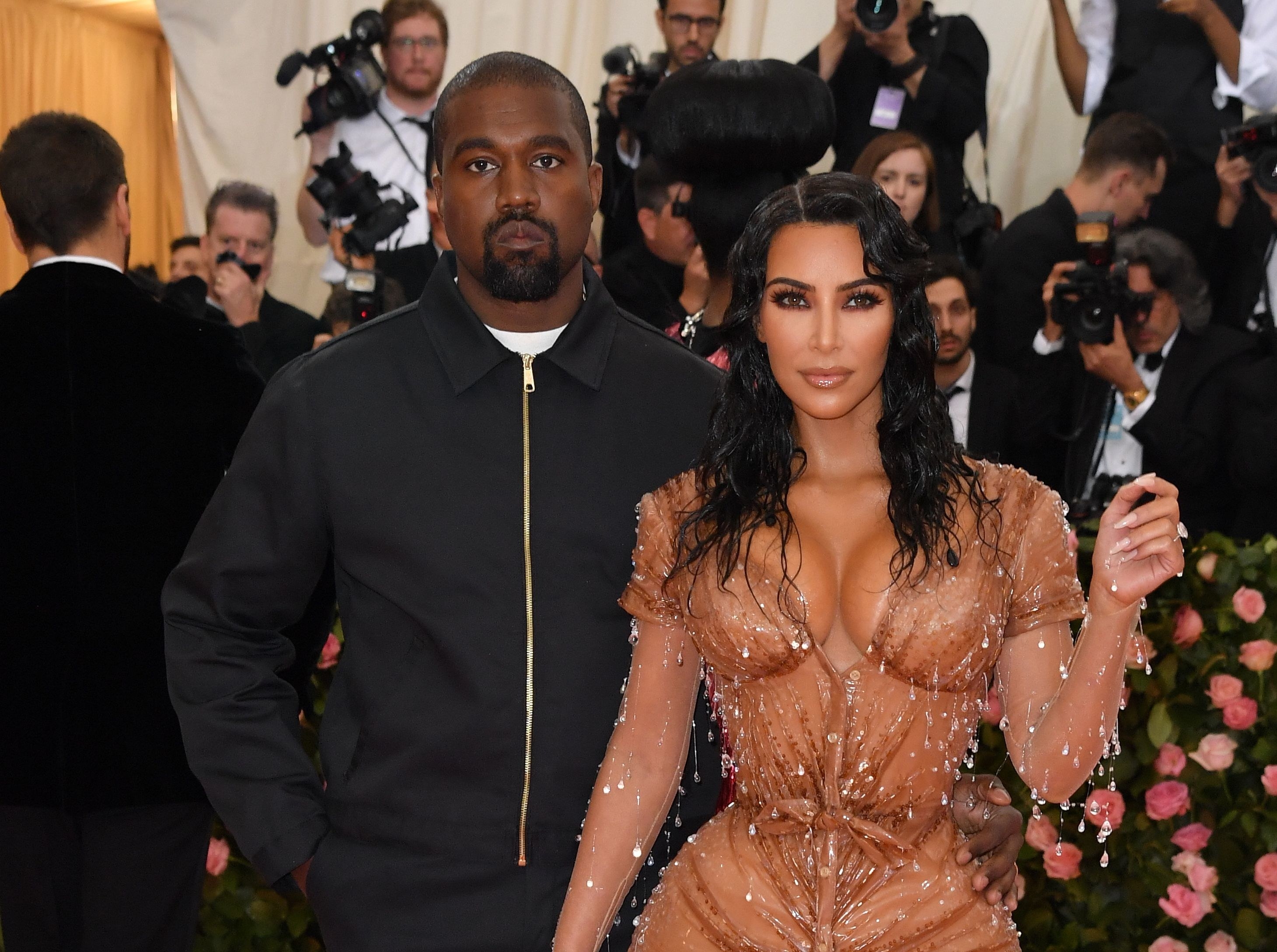 Kanye West Follows Kim Kardashian Again Amid Divorce, Cheating Rumors –  StyleCaster