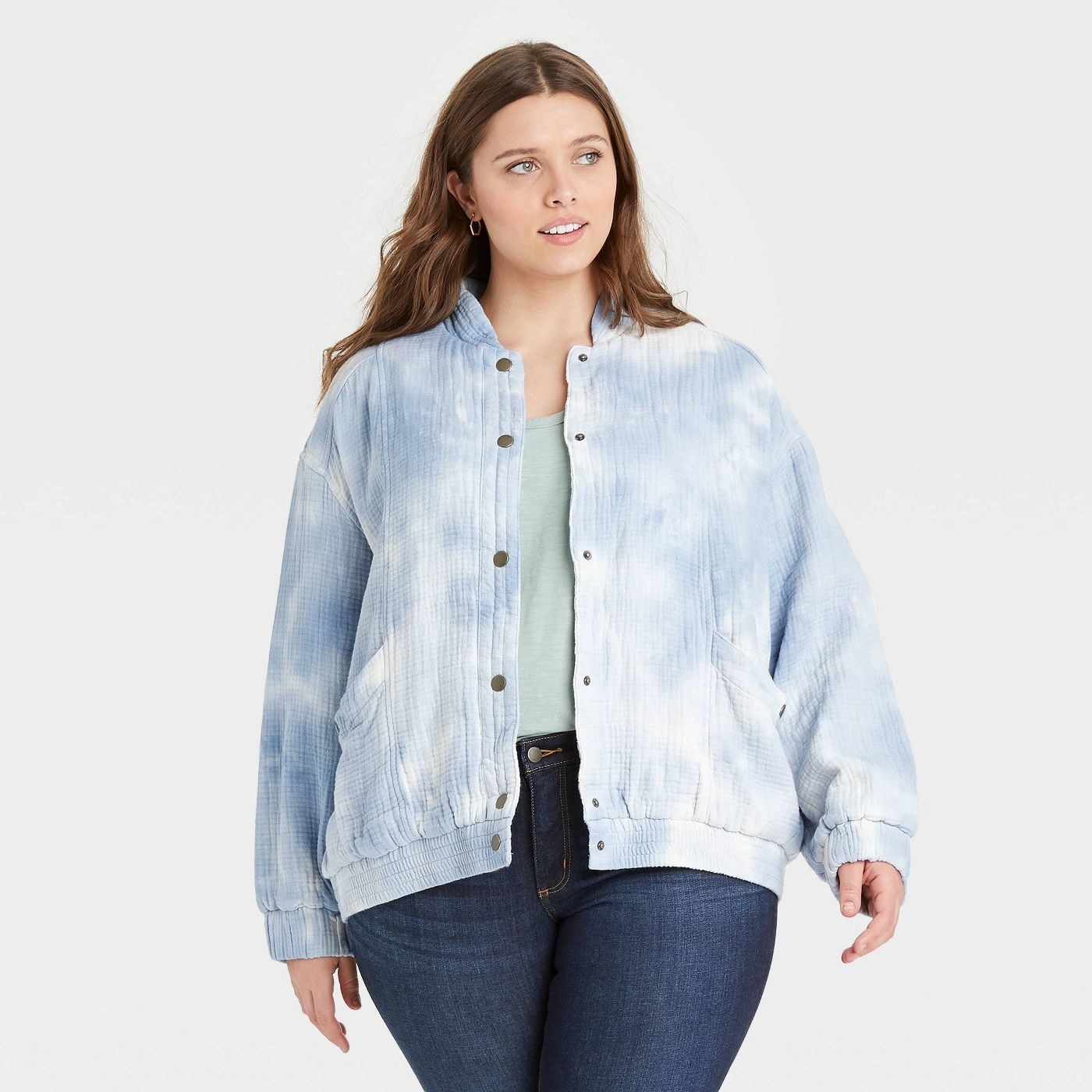 Model in blue tie dye cloth jacket