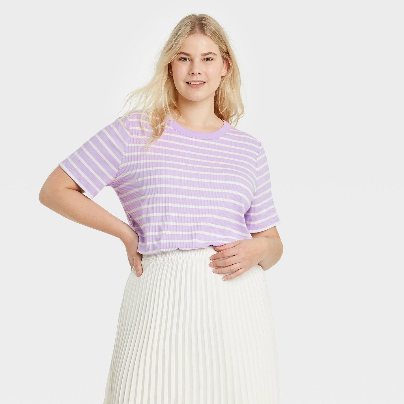 Model in short sleeve rib tshirt in pink and white stripe