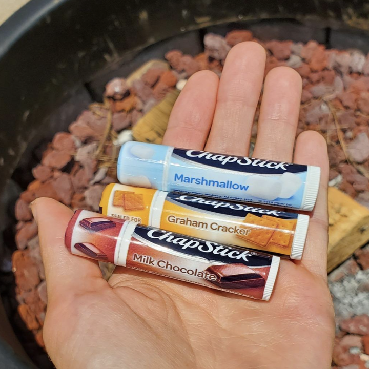 A customer review photo of them holding all three tubes of Chapstick