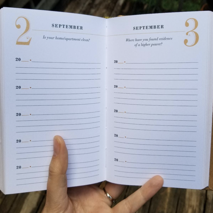 A customer review photo of the inside of the five-year journal showing the prompts
