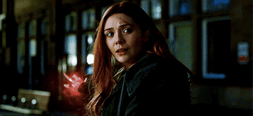 A gif of Wanda smiling and using her powers in &quot;Infinity War&quot;