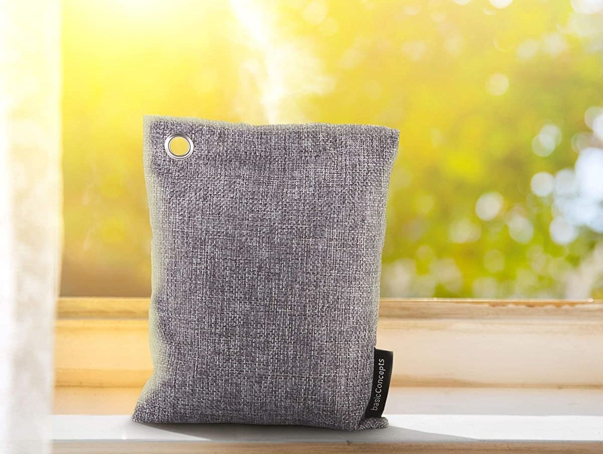 a gray charcoal filled pouch