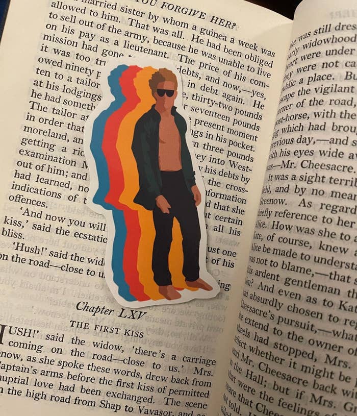 The Luis Miguel sticker placed in a book