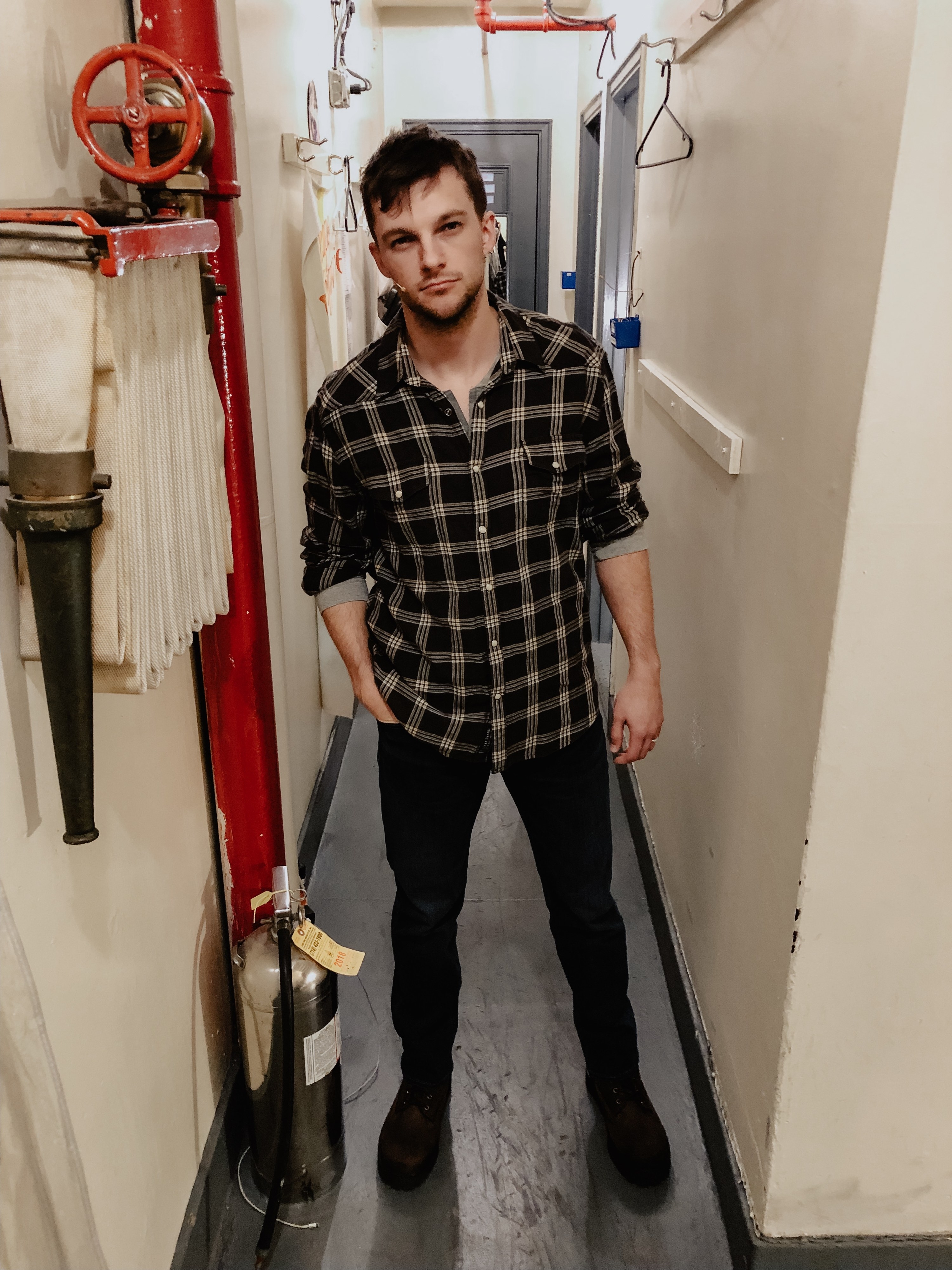 Dan posing backstage