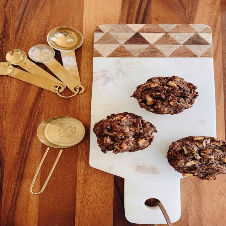 reviewer photo using the measuring cups and spoons to bake