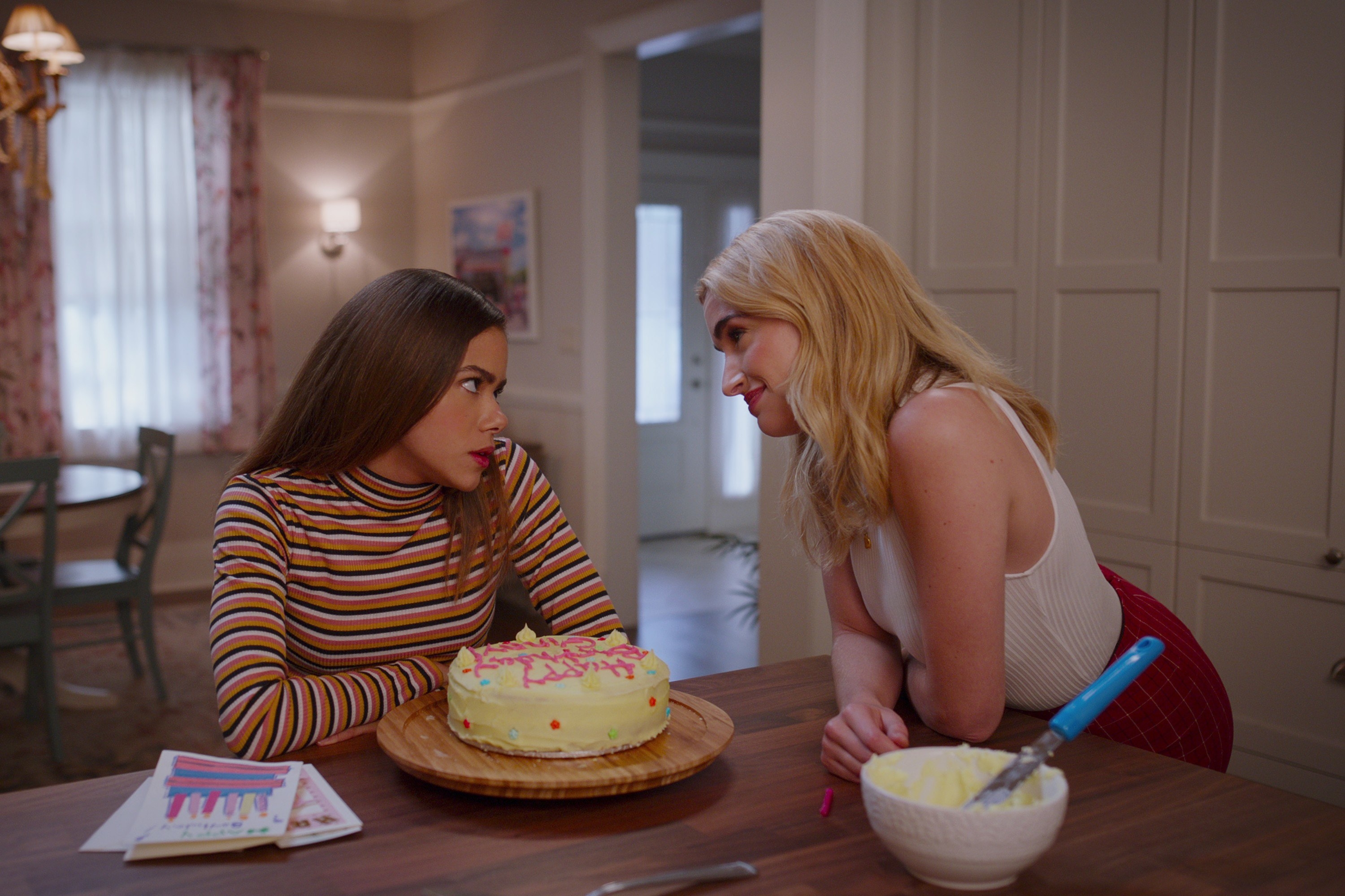 Ginny and Georgia on her 16th birthday with a birthday cake in front of them