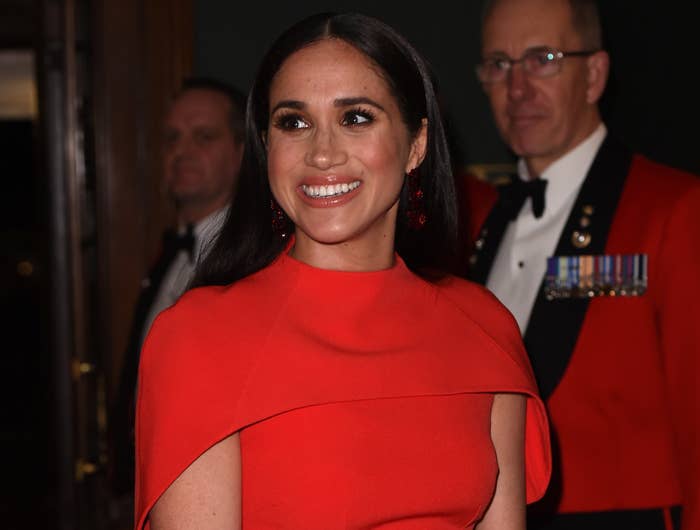 Meghan smiles at a royal event