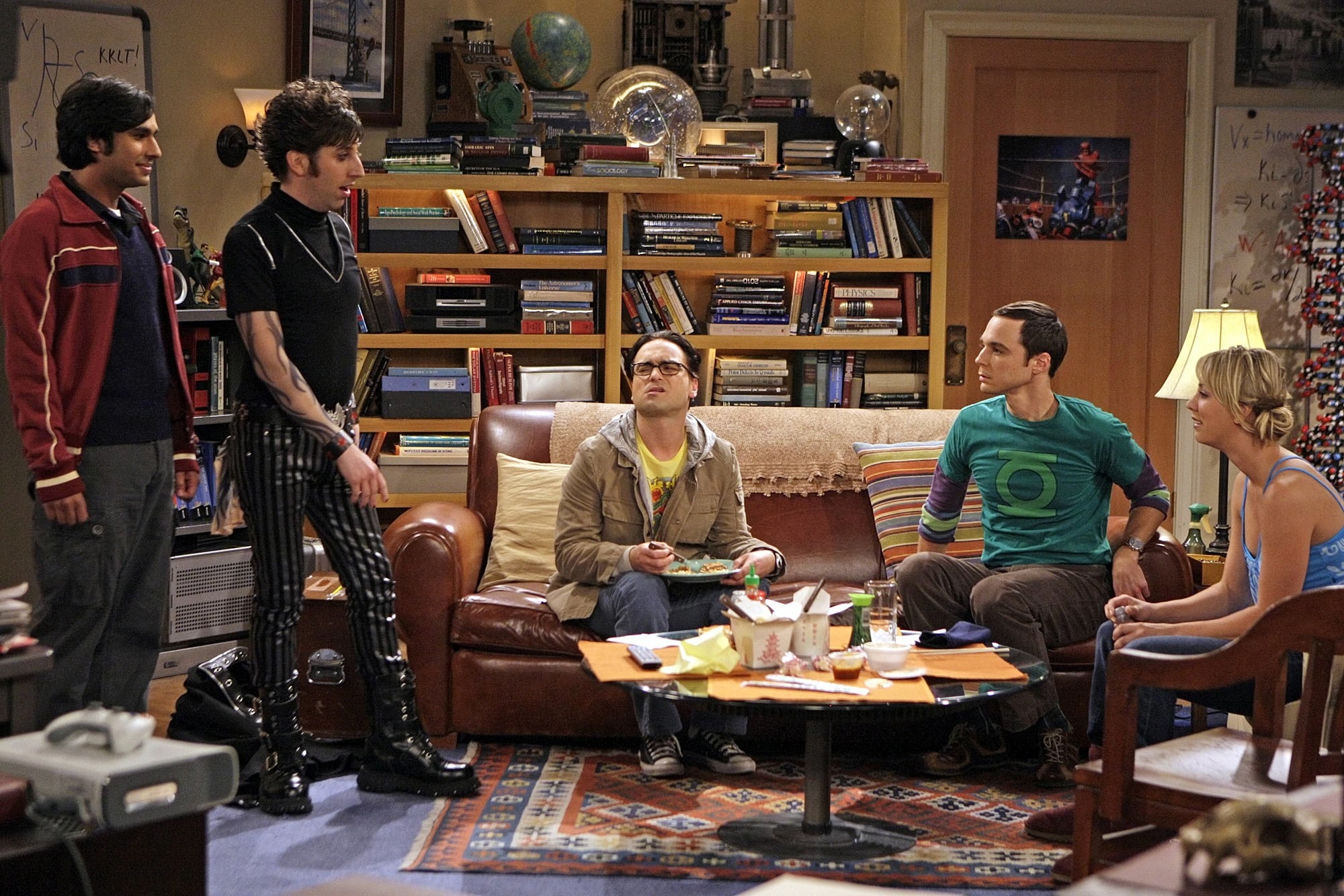 The main cast in the living room on The Big Bang Theory