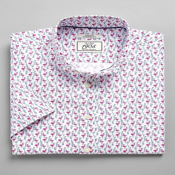 flat lay of short-sleeve button down in flamingo print