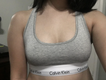 Daily News | Online News Reviewer wearing gray bra