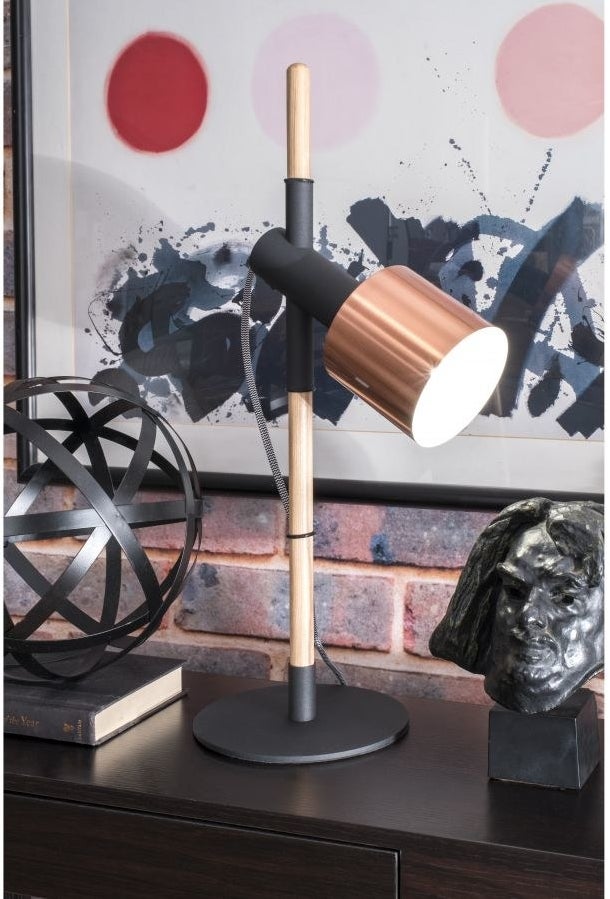 table lamp with black base and gold and black desk-lamp style light