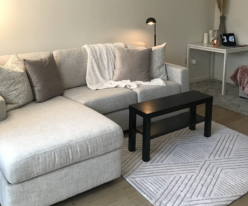A reviewer's couch with the pillows