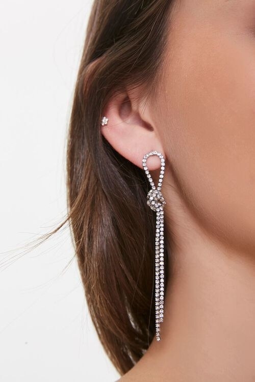 Model wearing the earrings