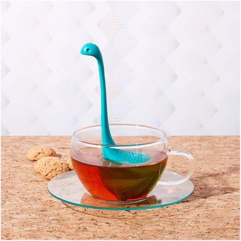 Loch ness monster shaped tea infuser in tea cup