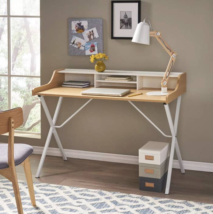 A modern white and wood computer desk