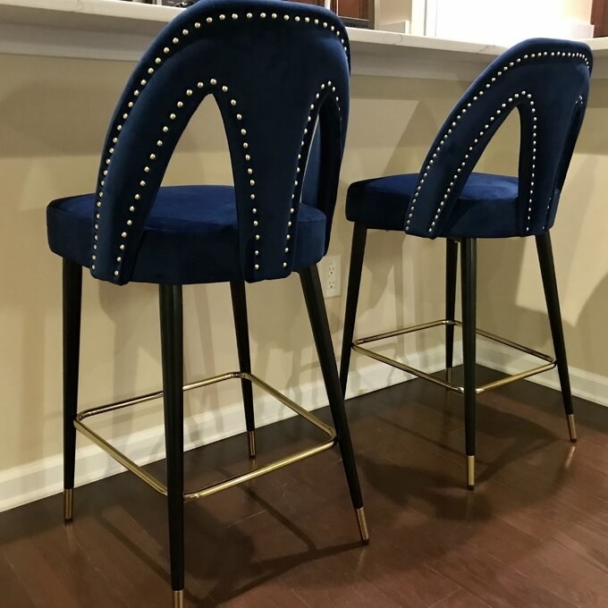 a reviewer&#x27;s photo of the cobalt stools