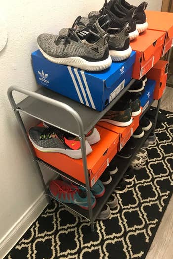 reviewer's organizer holding shoes and shoe boxes 