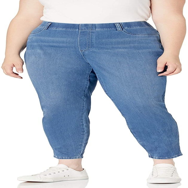 The jeggings in blue worn by a model