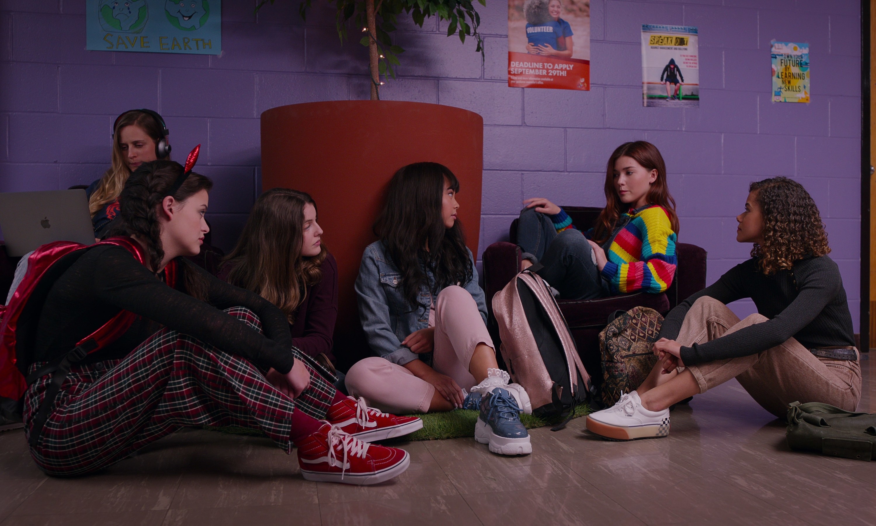 Max, Samantha, Norah, Abby, and Ginny sit on the floor 