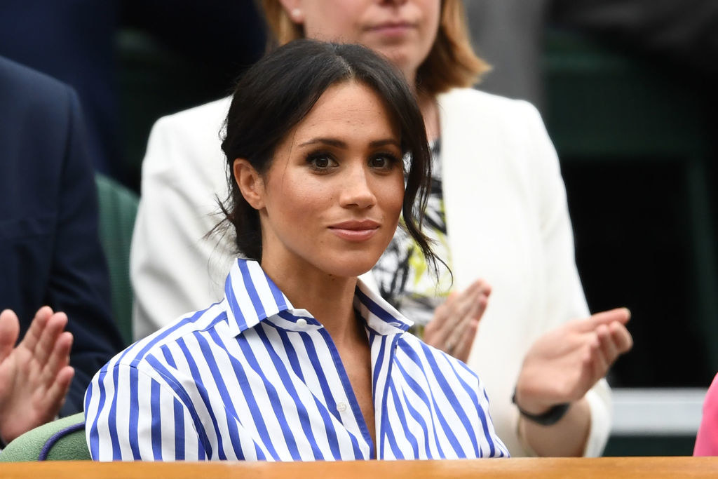 Meghan sitting in the stands during Wimbledon