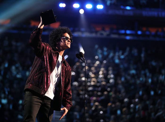 Bruno accepting an award on stage